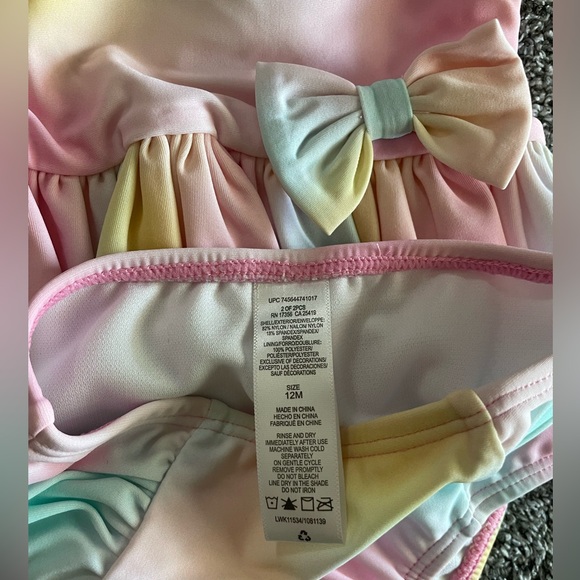 4 infant swim suits, 2 Minnie Mouse, 1 lion king and 1 multi colored - Picture 10 of 10